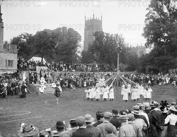 Children taking part in the village maypole dance at Chipping Campden, Gloucestershire