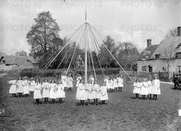 Village children taking part in the maypole dance at East Hanney, Oxfordshire, c1860-c1922