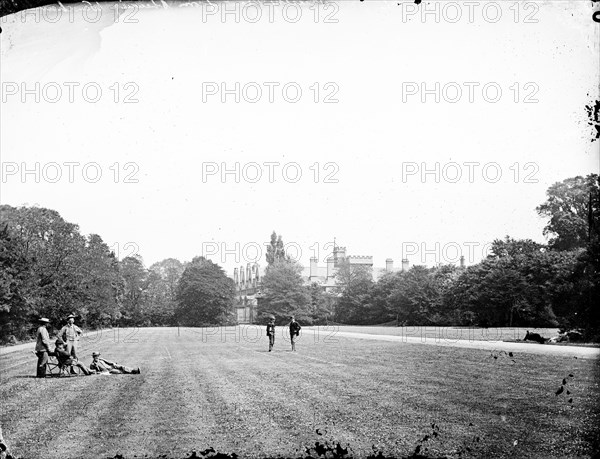 Group of men relaxing in Trinity College gardens, Oxford University, Oxfordshire, c1860-c1922