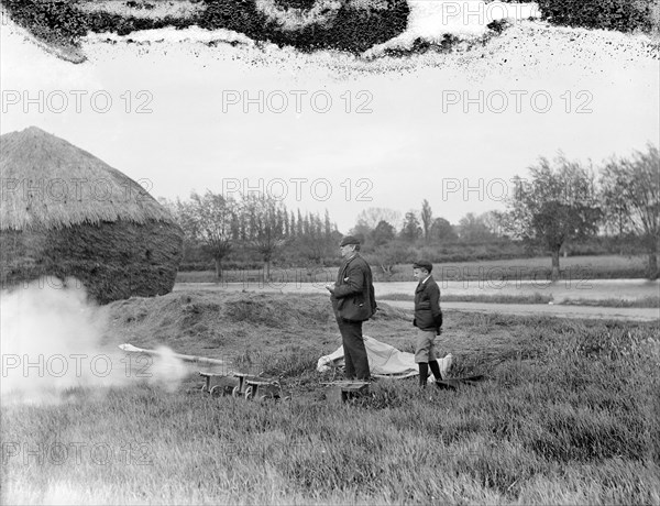 Tims the Timekeeper and starter, starting off a race during Eights Week, Oxford, c1860-c1922