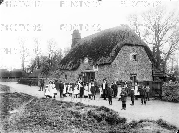 School children outside Hinton Waldrist Post Office, Oxfordshire, c1900