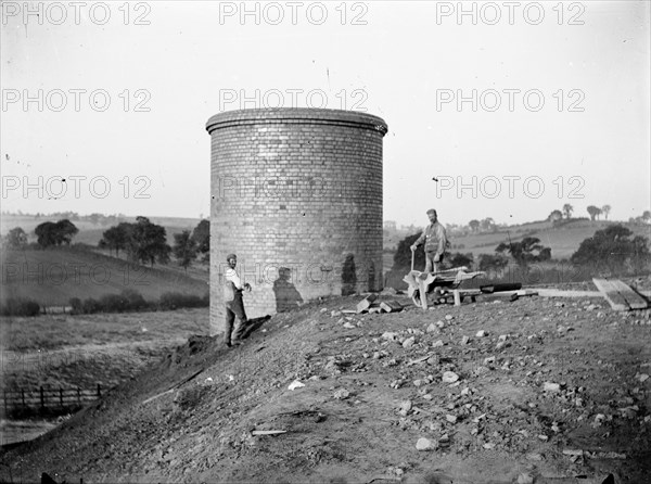 Construction workers near a ventilation chimney at Charwelton, Northamptonshire, c1873-c1923