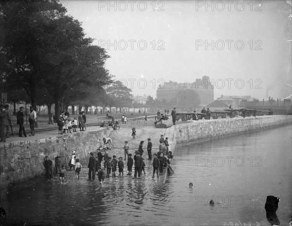 Children play ducks and drakes in the River Itchen, Southampton, Hampshire, c1878
