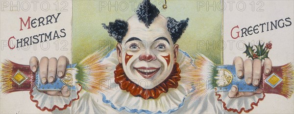 Christmas card; clown pulling a cracker, early 20th century. Artist: Unknown