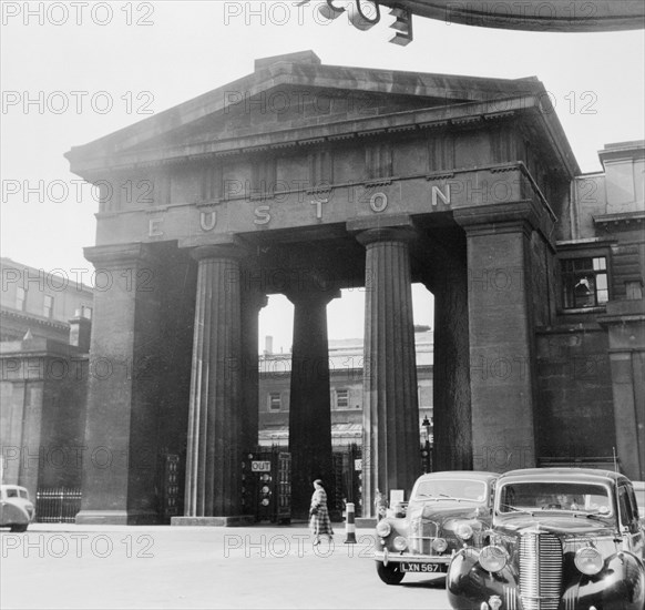 Arch outside the main entrance to Euston Station, Camden, London, 1952. Artist: Henry Grant