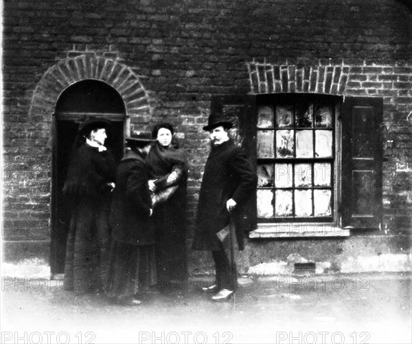 A missionary and three women, London, early 20th century. Artist: John Galt