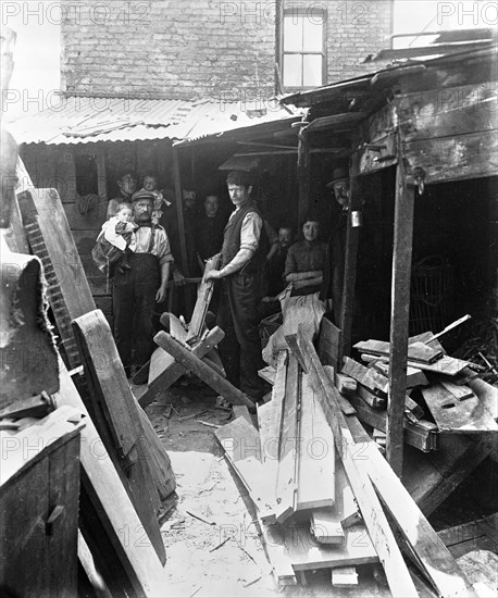 Making firewood from scrap timber, 1900s. Creator: John Galt.