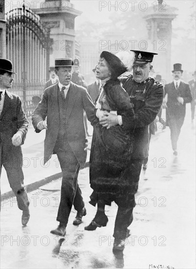 Emmeline Pankhurst arrested by Superintendent Rolfe outside Buckingham Palace, London, May 1914. Artist: Unknown