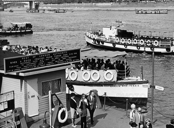 Tourists on a river cruise, Tower Pier, Tower Hamlets, London, c1960s. Artist: Unknown