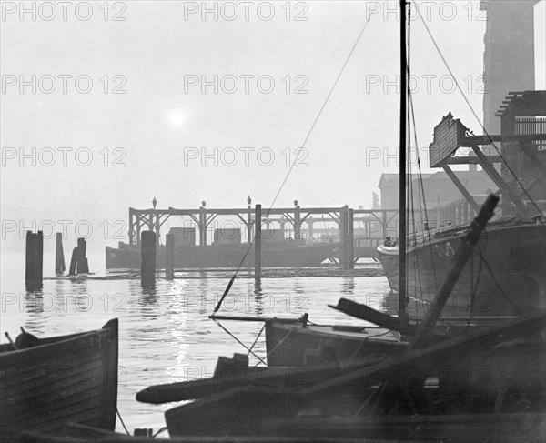 Sunrise over Lambeth waterfront looking east, London, early 1930s. Artist: George Davison Reid