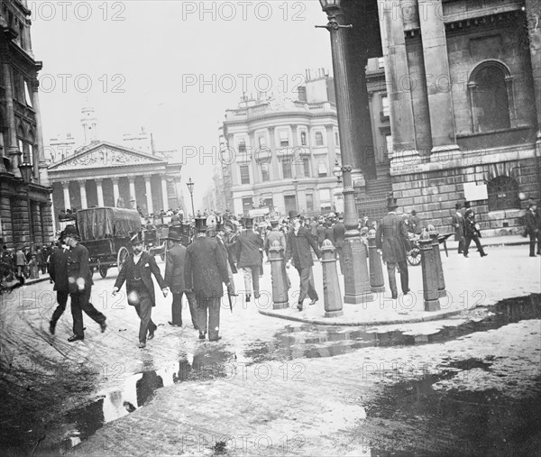 Businessmen by the Bank of England and the Royal Exchange, City of London, (1920s?). Artist: John H Stone