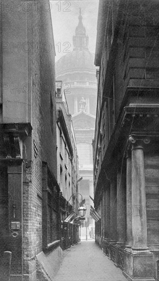 St Paul's Cathedral seen through a narrow courtyard, City of London. Artist: Unknown