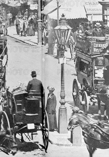 The Strand with Charing Cross Station to the right, Westminster, London, c1900. Artist: Unknown