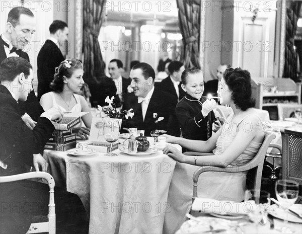 People dining at the Trocadero Restaurant, Leicester Square, London, 1939. Artist: Unknown