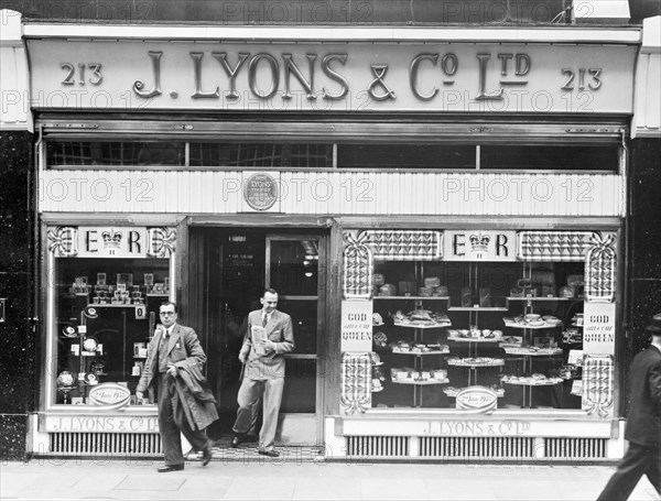 The exterior of a Lyons tea shop along Piccadilly, London, 2nd July 1953. Artist: Unknown