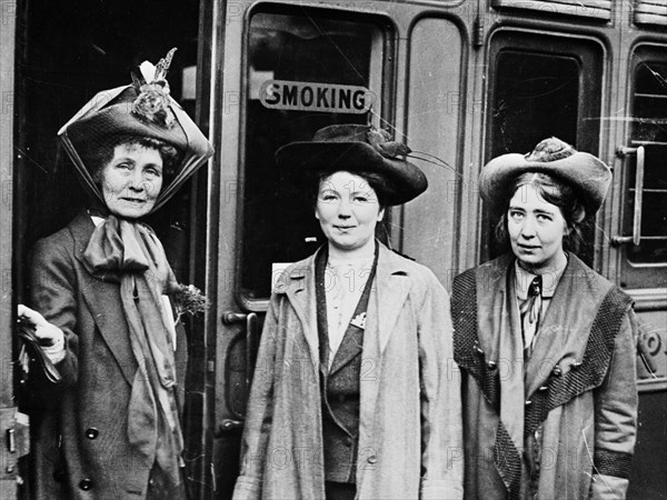 Emmeline, Christabel and Sylvia Pankhurst, Waterloo Station, London, 1911. Artist: Unknown