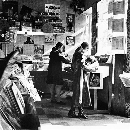 Two women in a London record store, c1960s. Artist: Henry Grant