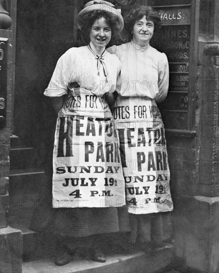 Mabel Capper and Patricia Woodlock advertising a meeting, Manchester, Lancashire, July 1908. Artist: Unknown