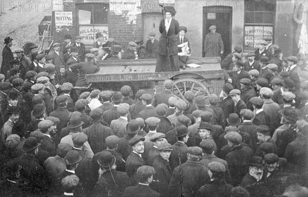 Isabel Seymour addressing a crowd of men and boys from a tradesman's cart, 1908. Artist: Unknown