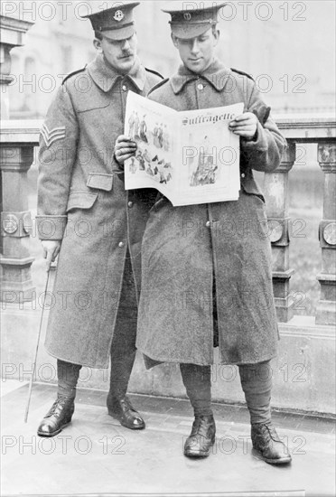 Soldiers reading the Suffragette newspaper, April 1915. Artist: Unknown