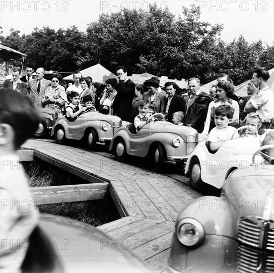 Hampstead fun fair, London, 1954. Artist: Henry Grant