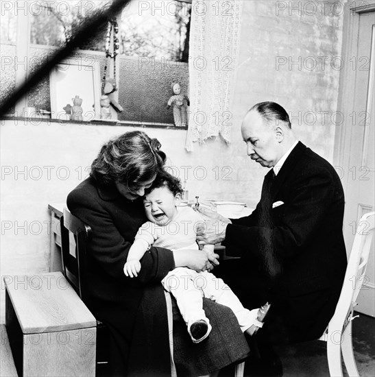 Baby being immunised, London, 1953. Artist: Henry Grant