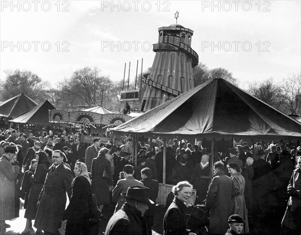 Hampstead funfair, London, early 1950s. Artist: Henry Grant