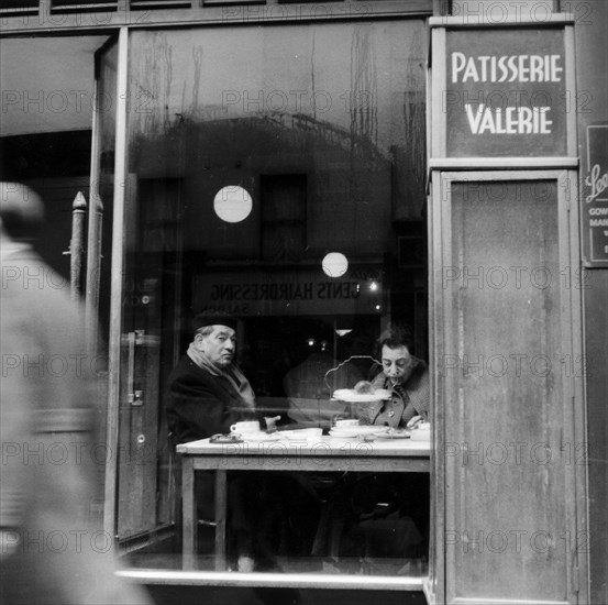 Italians eating and drinking in a cafe in Soho, London, 1955. Artist: Henry Grant