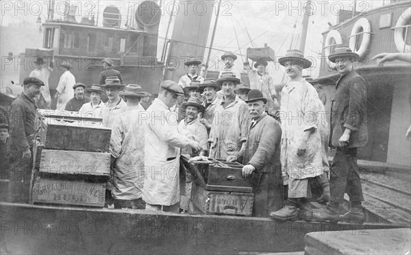 Market porters at Billingsgate, London, (c1930s?). Artist: Unknown