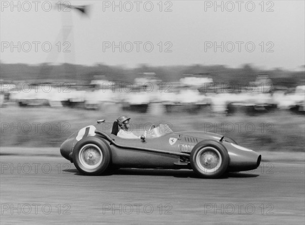 Peter Collins in a Ferrari Dino, British Grand Prix, Silverstone, 1958. Artist: Unknown