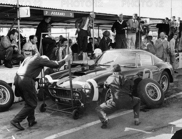 Stirling Moss in a Ferrari, Goodwood, 1961. Artist: Unknown