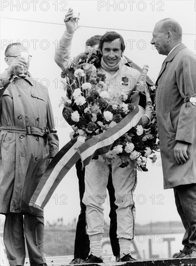 Jackie Stewart, celebrating victory at The Dutch Grand Prix, Zandvoort, 1968. Artist: Unknown