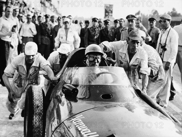 Stirling Moss in a Vanwall, Italian Grand Prix, Monza, 1957. Artist: Unknown