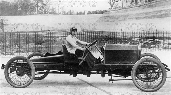 Miss Dorothy Levitt, in a 26hp Napier, Brooklands, 1908. Artist: Unknown