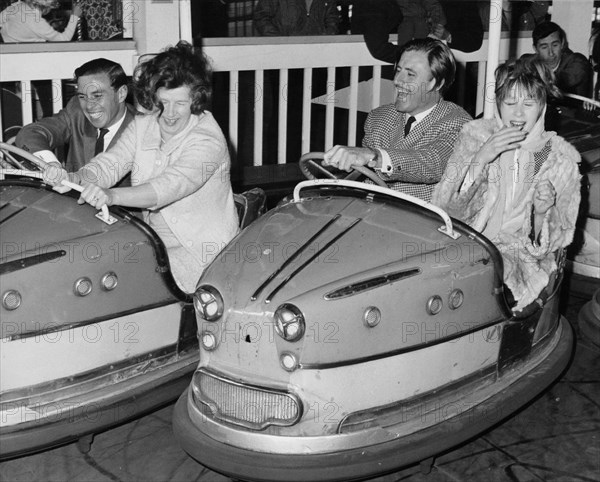 Graham Hill and Jim Clark on Dodgem cars at Butlins, Bognor Regis, 1960s. Artist: Unknown