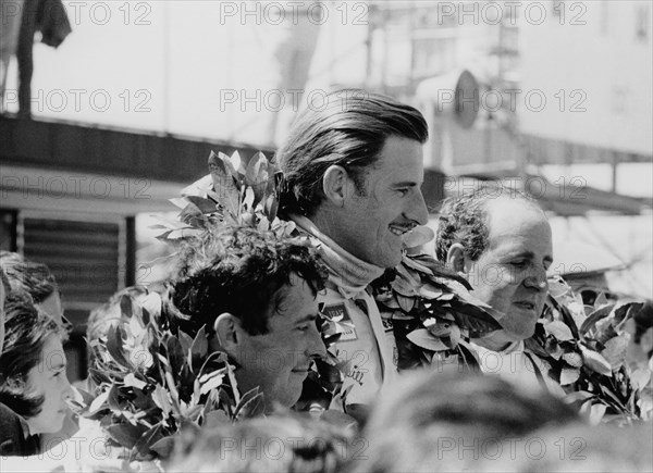 Graham Hill, Denny Hulme and Brian Redman, Spanish Grand Prix, 1968. Artist: Unknown
