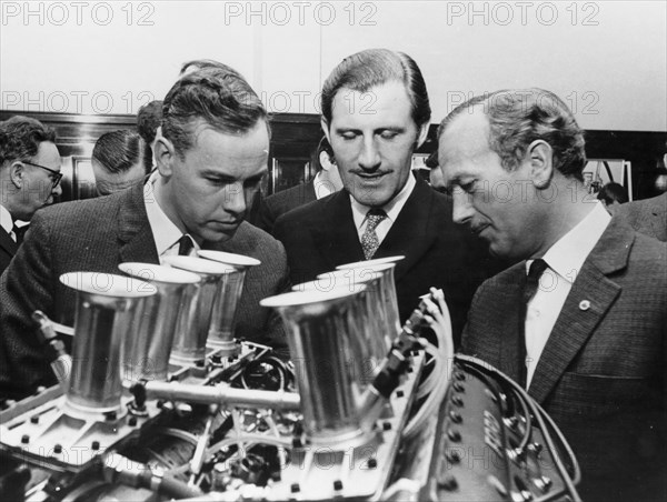 Graham Hill with Colin Chapman, c1967-c1970. Artist: Unknown