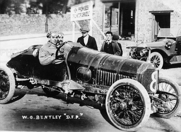 WO Bentley at the wheel of his DFP car, 1914. Artist: Unknown