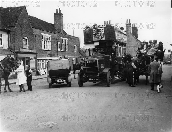 Bus on a street in Amersham, Buckinghamshire. Artist: Unknown