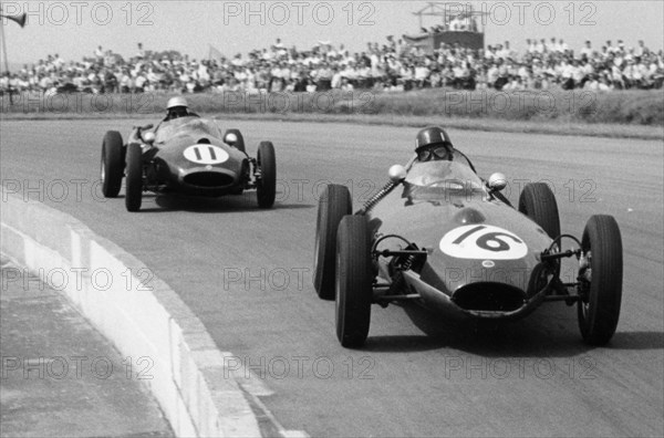 Graham Hill and Jack Brabham racing in the XI British Grand Prix, Silverstone, July 1958. Artist: Unknown