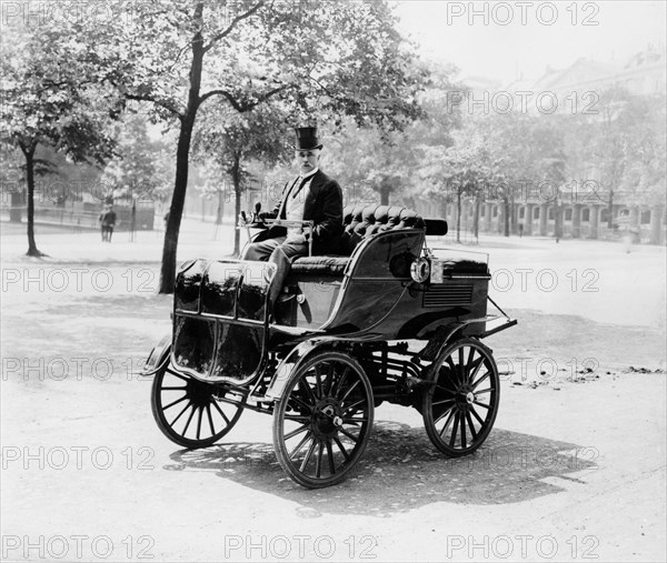 Roger Wallace in his electric car, 1899. Artist: Unknown