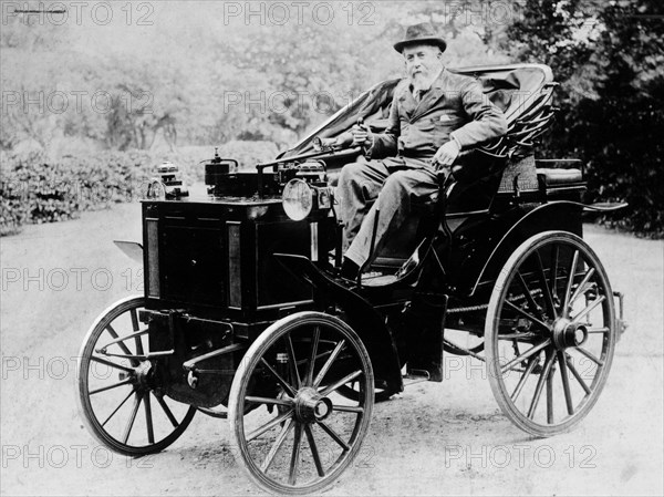 Evelyn Ellis driving an 1895 Panhard, (1895?). Artist: Unknown