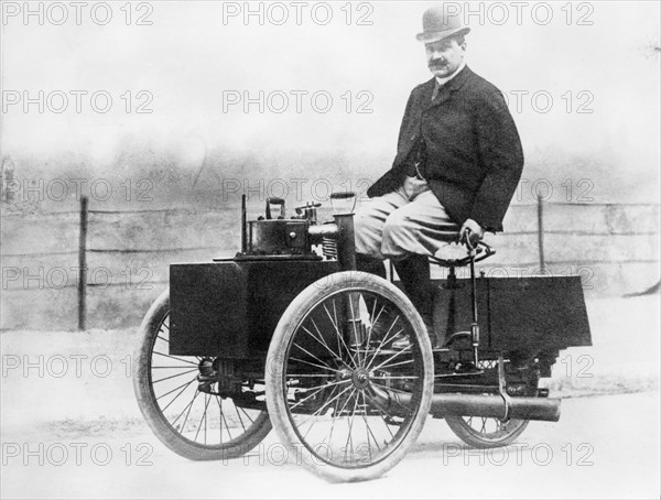 Albert de Dion on a steam tricycle, 1888. Artist: Unknown