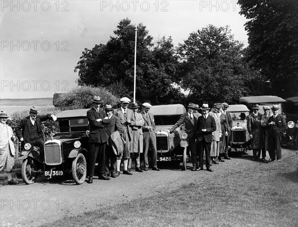 Group of people and cars on a country road, (c1930s?). Artist: Unknown