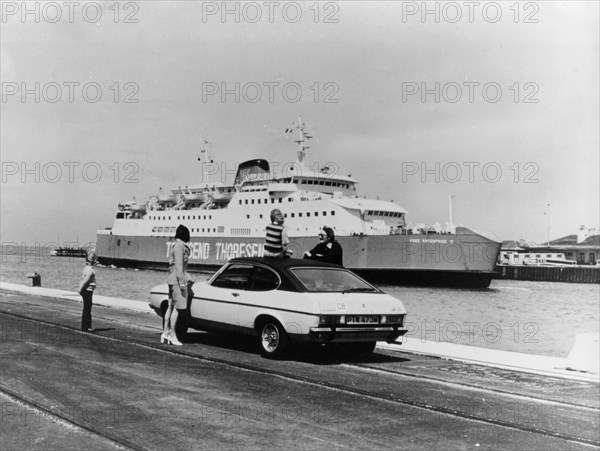 A 1974 Ford Capri on a quay, in front of a Townsend Thoresen car ferry, 1970s. Artist: Unknown