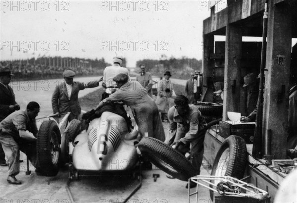 Auto Union in the pits during a Grand Prix, 1938. Artist: Unknown