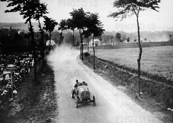Alessandro Cagno driving his Itala, French Grand Prix, Dieppe, 1908. Artist: Unknown