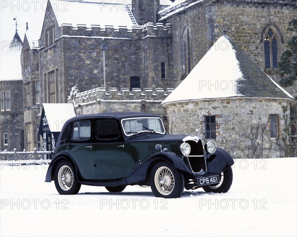 A 1934 Riley Falcon in the snow. Artist: Unknown