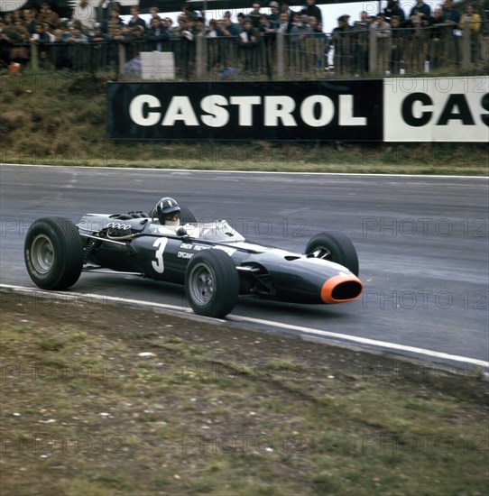 Graham Hill racing a BRM P261, British Grand Prix, Brands Hatch, Kent, 1966. Artist: Unknown