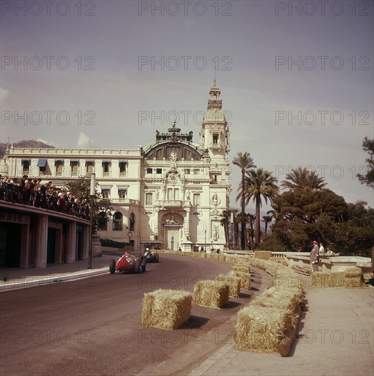 Two racing cars taking a bend, Monaco Grand Prix, Monte Carlo, 1959. Artist: Unknown
